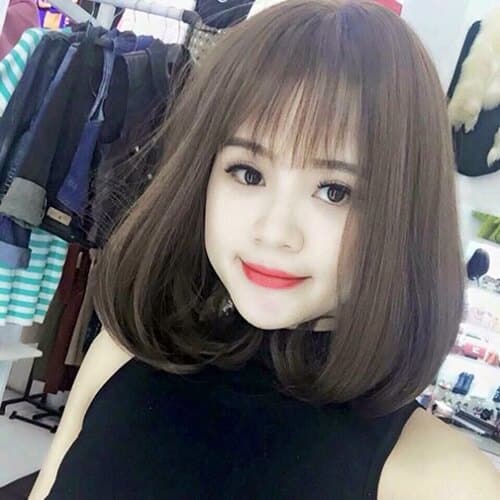 Tóc uốn cụp màu đen